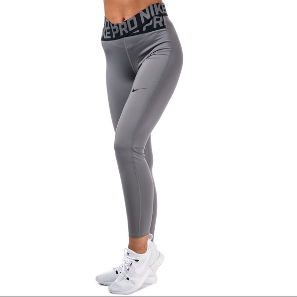Nike Pants - Nike Intertwist Crossover Silver Leggings